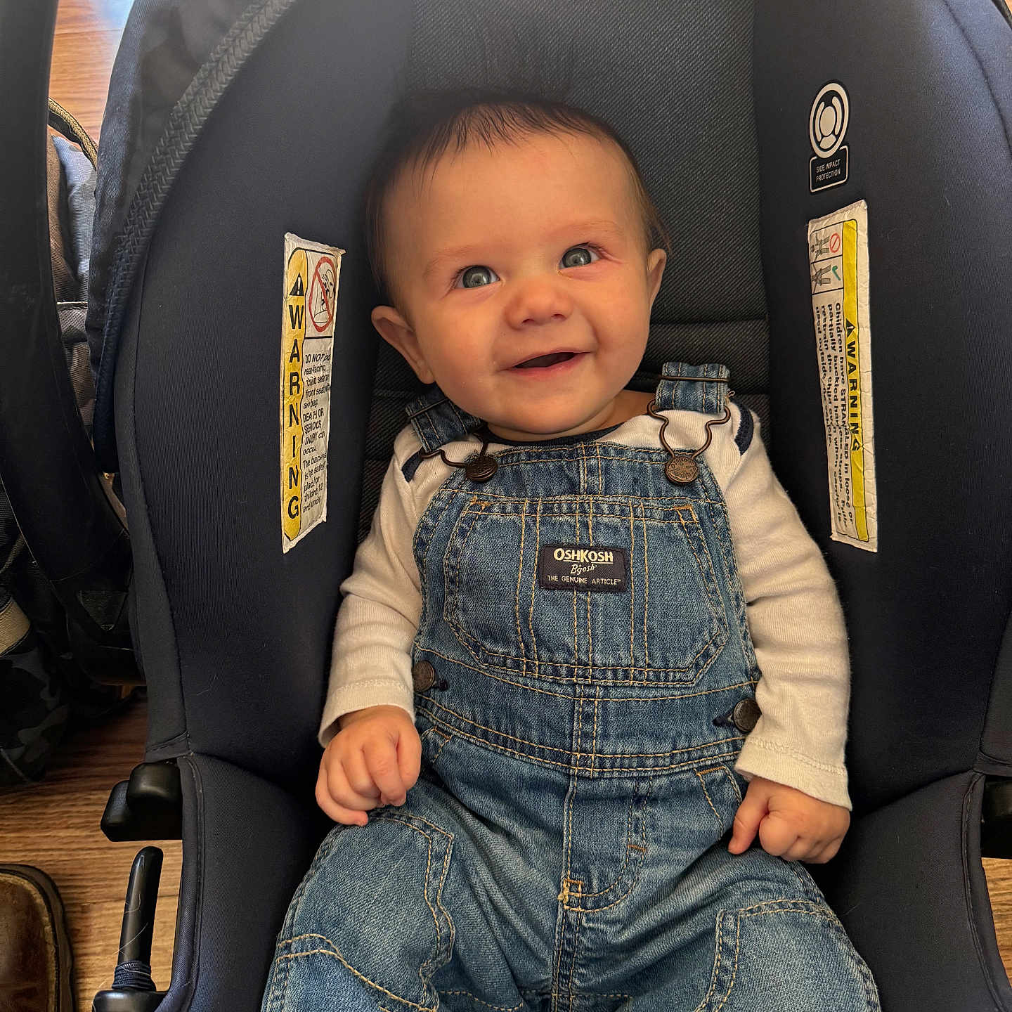 Michael Braxton joined the competition — help win amazing prizes! baby, car, car_interior, carseat, clothing, coat, cushion, face, happy, head, homedecor, jacket, jeans, pants, person, photography, portrait, transportation, vehicle, vest