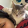 Asher is registered to the contest to win money with this photo: cat, person, sleeping, indoor, pillow, hat, wall, resting, closeup, face, animal, pet, cozy, relaxed, feline, comfort, red, gray, white, fur