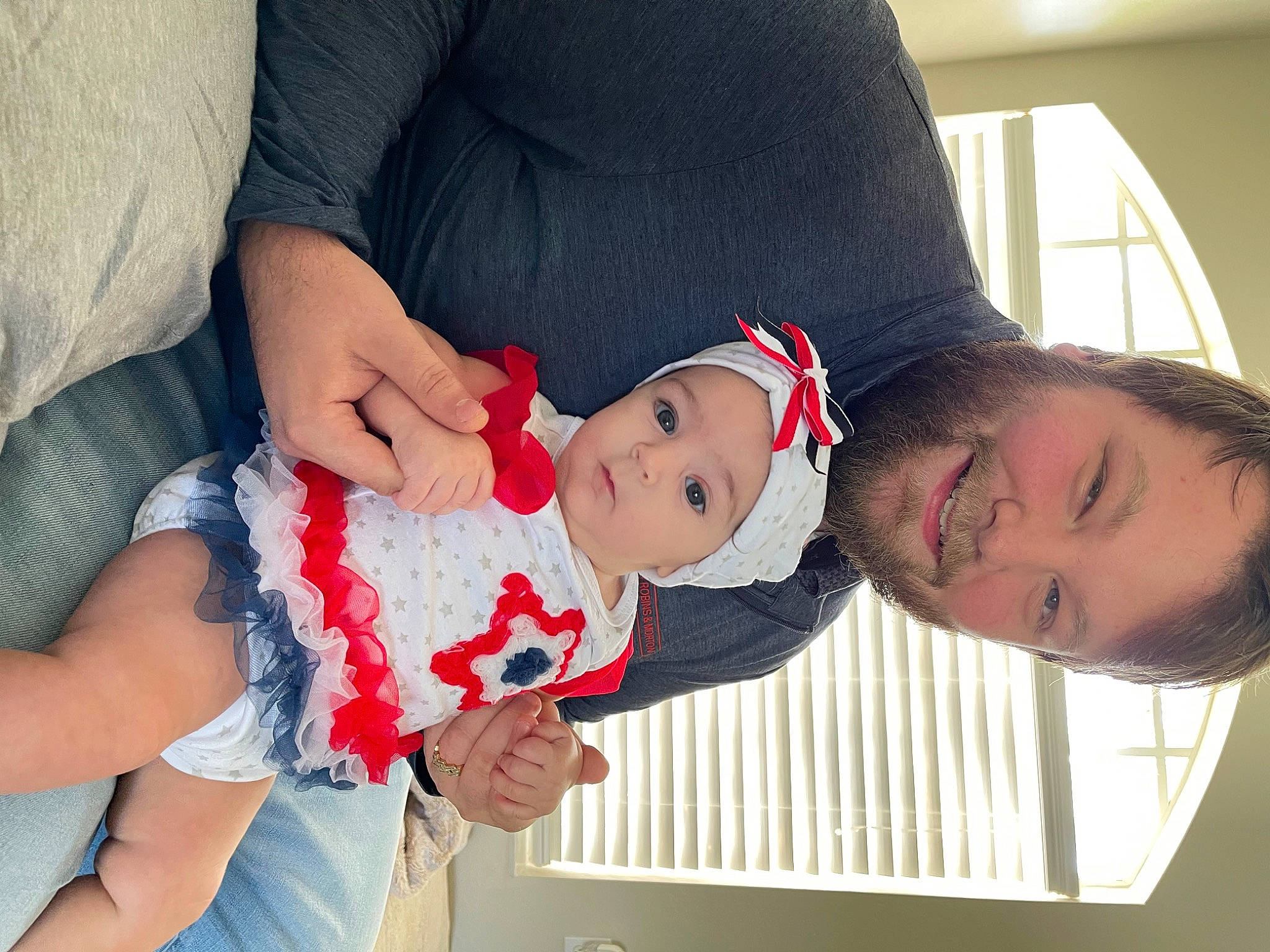 Juliette is registered to the contest to win money with this photo: baby, baby_products, baby_toddler_clothing, cheek, child, comfort, event, finger, fun, happy, hat, headwear, joy, lap, pattern, person, room, sitting, skin, sleeve