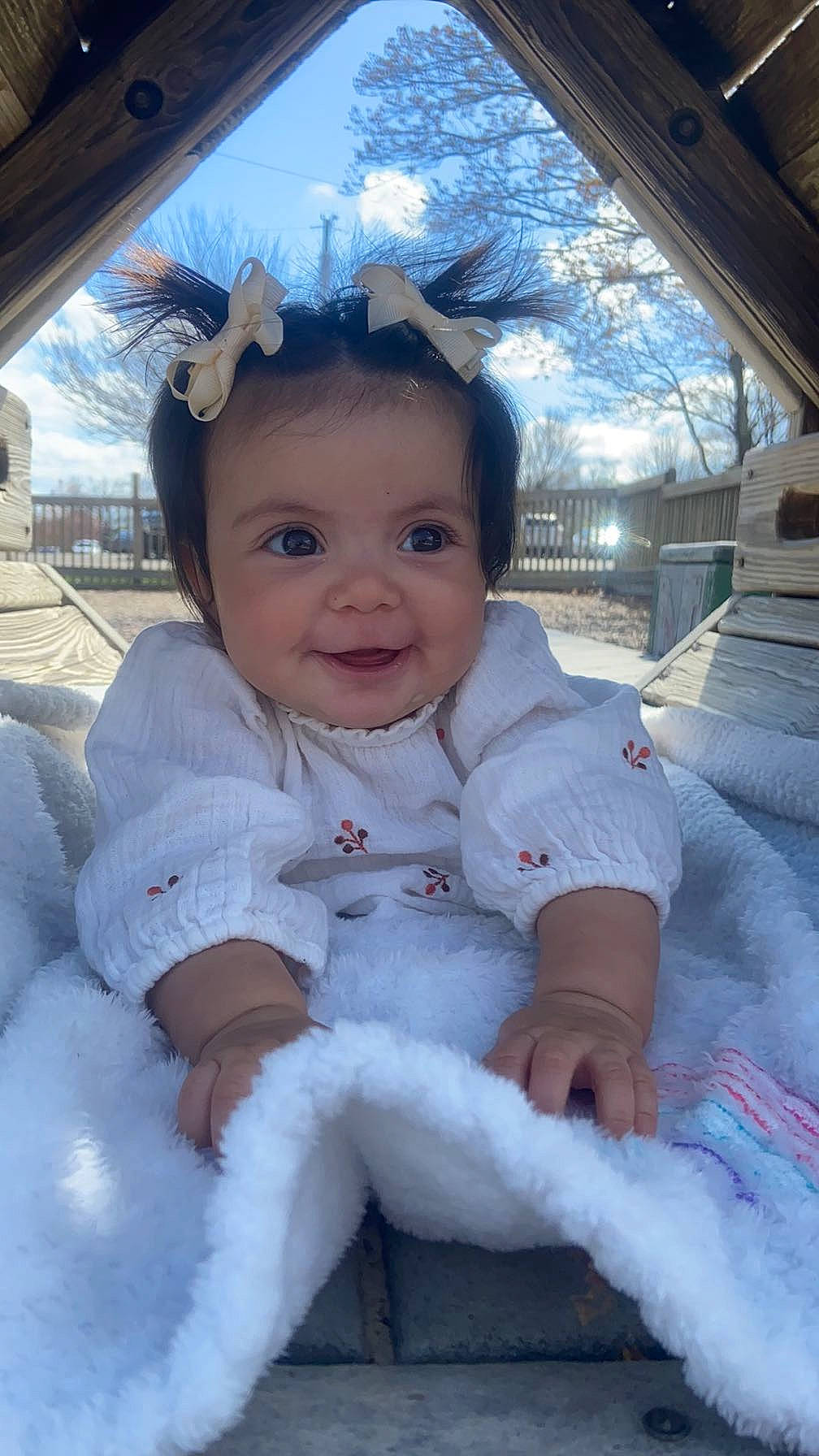 Luna joined the competition — help win amazing prizes! architecture, baby, building, city, clothing, dress, face, happy, head, outdoors, person, photography, plant, playarea, portrait, road, shelter, street, tree, urban