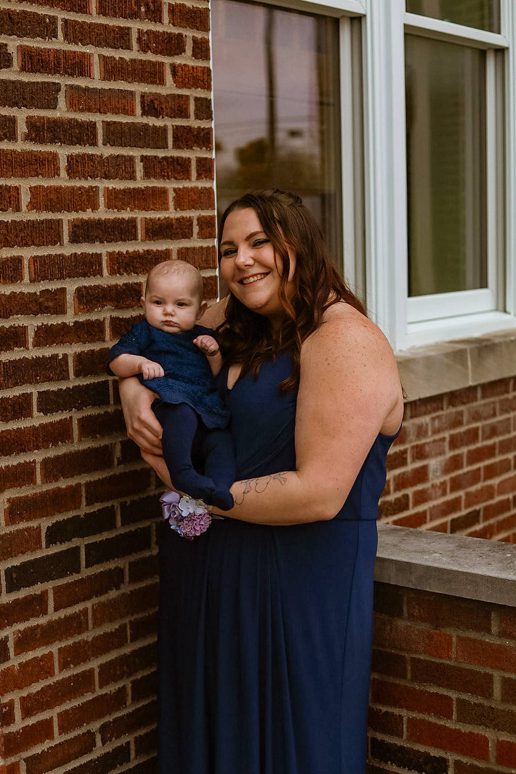 Xaviah joined the competition — help win amazing prizes! brick, brickwork, building, child, dress, electric_blue, event, flash_photography, formal_wear, fun, gesture, hairstyle, happy, house, interaction, joy, person, shoulder, smile, standing