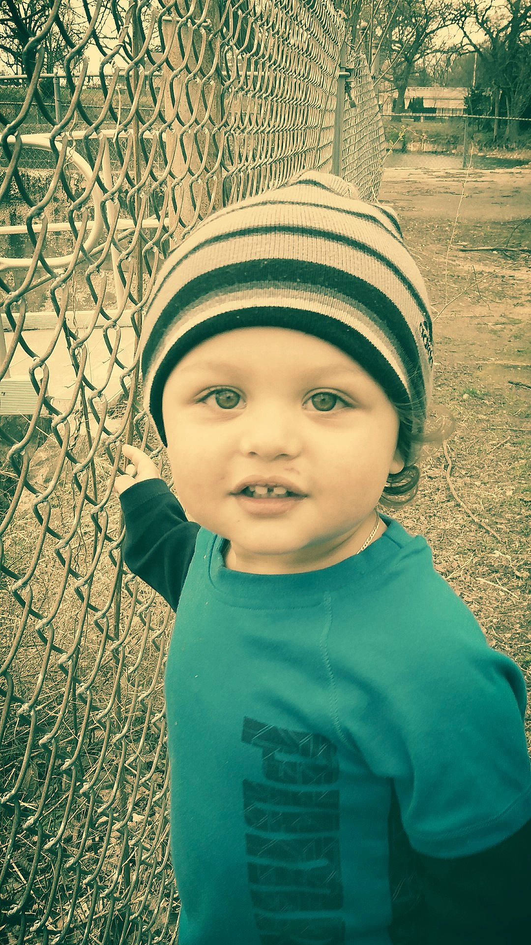 Sebastian is registered to the contest to win money with this photo: beauty, blue, cap, child, clothing, color, dress, girl, green, head, headwear, infant, person, photograph, portrait, portrait_photography, skin, smile, toddler