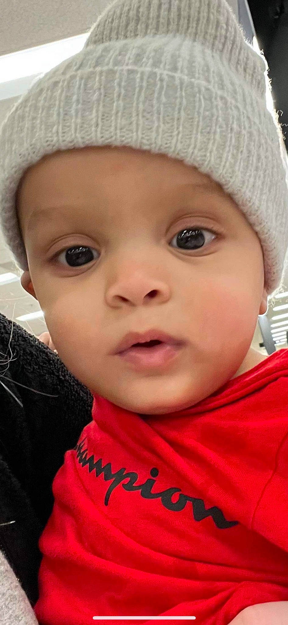 Giovanni is registered to the contest to win money with this photo: baby, cap, cheek, chin, cool, eyebrow, eyelash, face, forehead, hat, headgear, headwear, knit_cap, lip, nose, organ, outerwear, person, photograph, skin