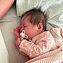 Lottie-Lil is registered to the contest to win money with this photo: adult_arm, baby, bed, blanket, closeup, cozy, cuddly, cute, hand, indoors, infant, newborn, pacifier, peaceful, pink_clothing, portrait, quilting, resting, sleeping, soft