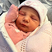 Lottie-Lil is registered to the contest to win money with this photo: newborn, baby, sleeping, pink, white, blanket, hat, mitten, face, peaceful, cute, infant, closeup, soft, wrapped, child, portrait, love, resting, cozy