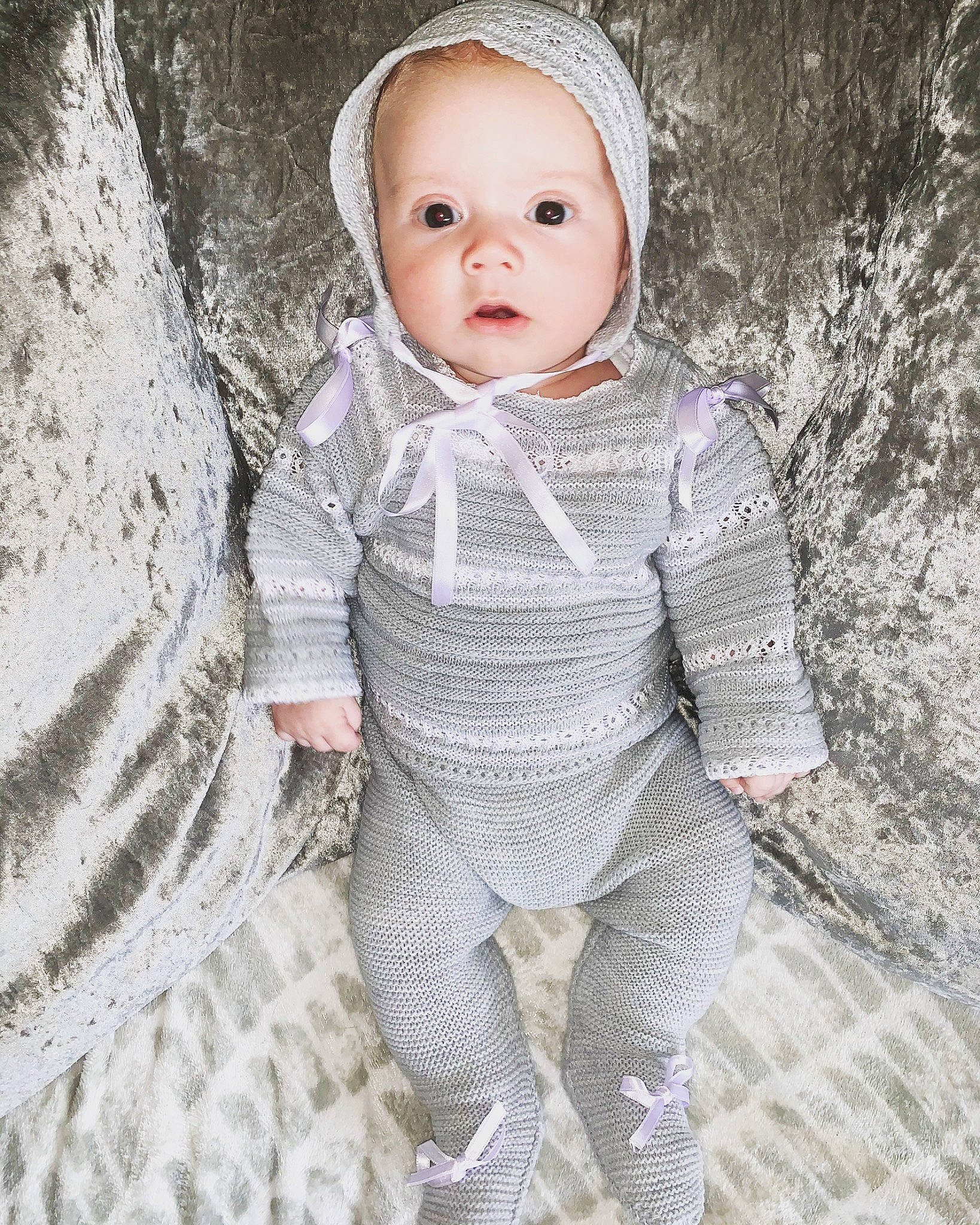 Georgie is registered to the contest to win money with this photo: art, baby, child, child_model, design, doll, eye, face, head, headgear, knitting, outerwear, pattern, person, photography, portrait, skin, smile, toddler, white