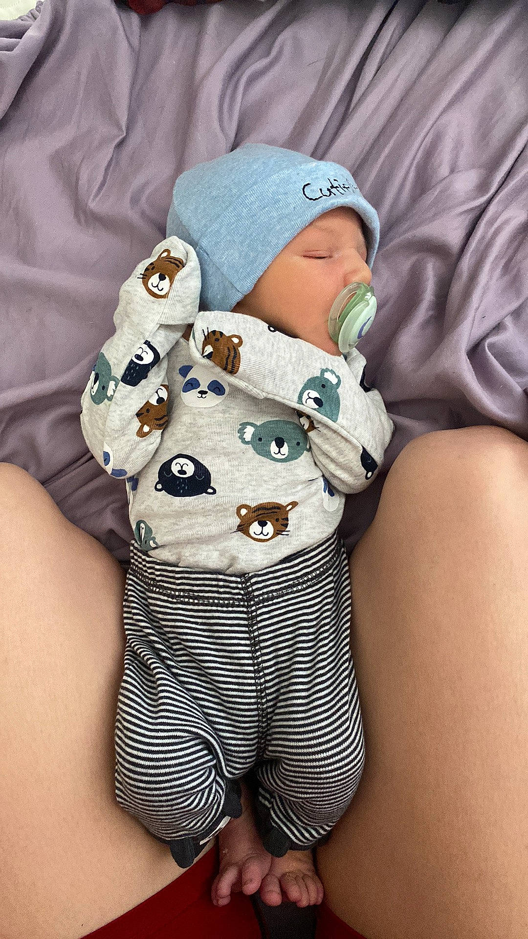 Kohen is registered to the contest to win money with this photo: baby, baby_products, baby_safety, baby_sleeping, baby_toddler_clothing, cap, child, comfort, hat, headwear, human_leg, infant_bodysuit, linens, pattern, person, personal_protective_equipment, portrait_photography, sitting, sleeve, t_shirt