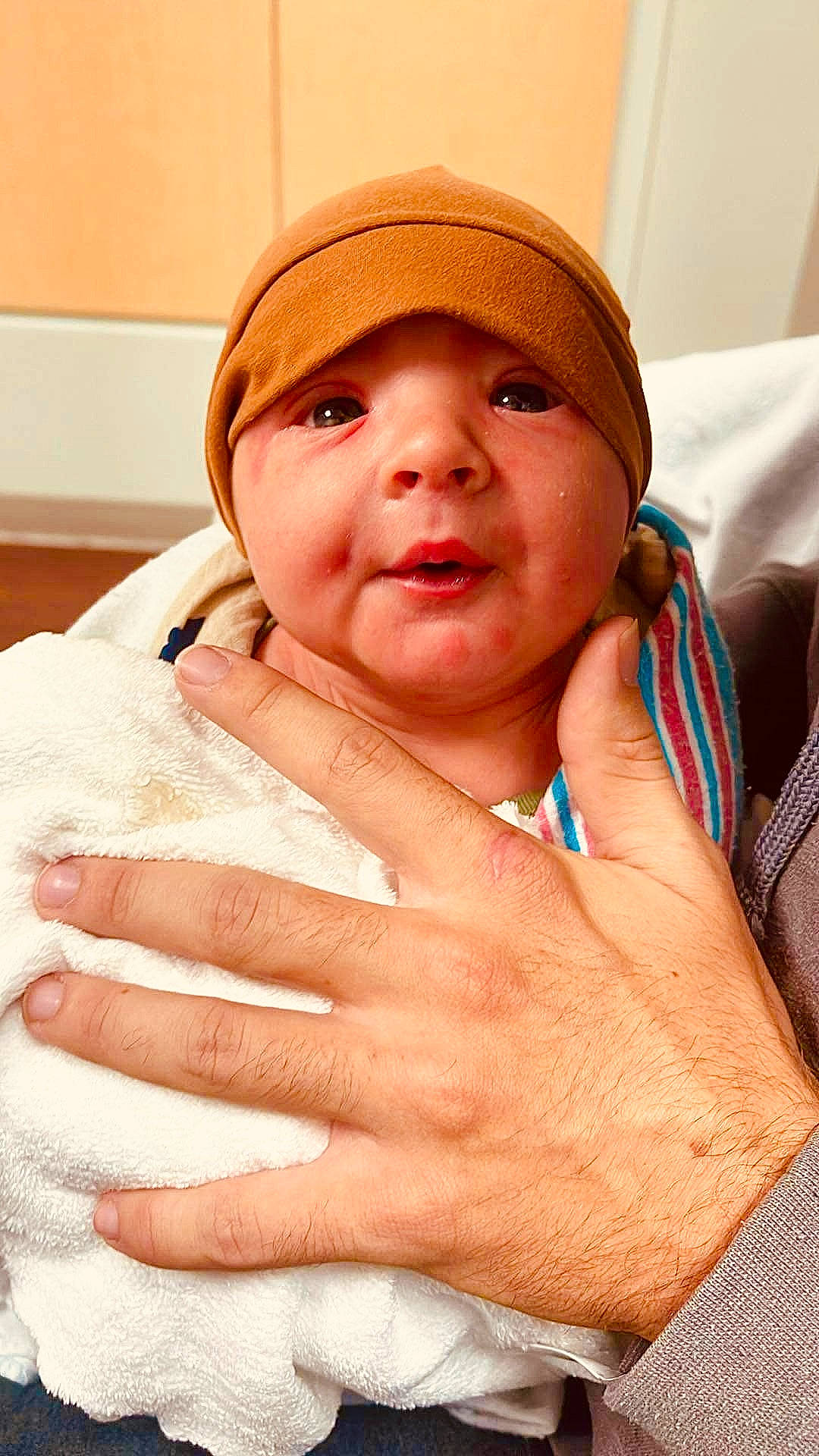 Kai joined the competition — help win amazing prizes! baby, cap, cheek, child, close_up, comfort, eyebrow, eyelash, finger, gesture, hand, happy, headwear, lip, mouth, nail, neck, nose, person, skin