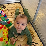 Andre joined the competition — help win amazing prizes! baby, child, playpen, playmat, pajamas, crawling, drool, toy, colorful, infant, face, hands, floor, patterned, curious, indoors, soft, cute, young, person