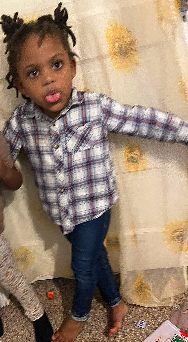 Ava joined the competition — help win amazing prizes! cool, dress_shirt, eye, face, gesture, hair, happy, leg, lip, nose, organ, person, photograph, plaid, skin, sleeve, standing, surprise, tartan, textile