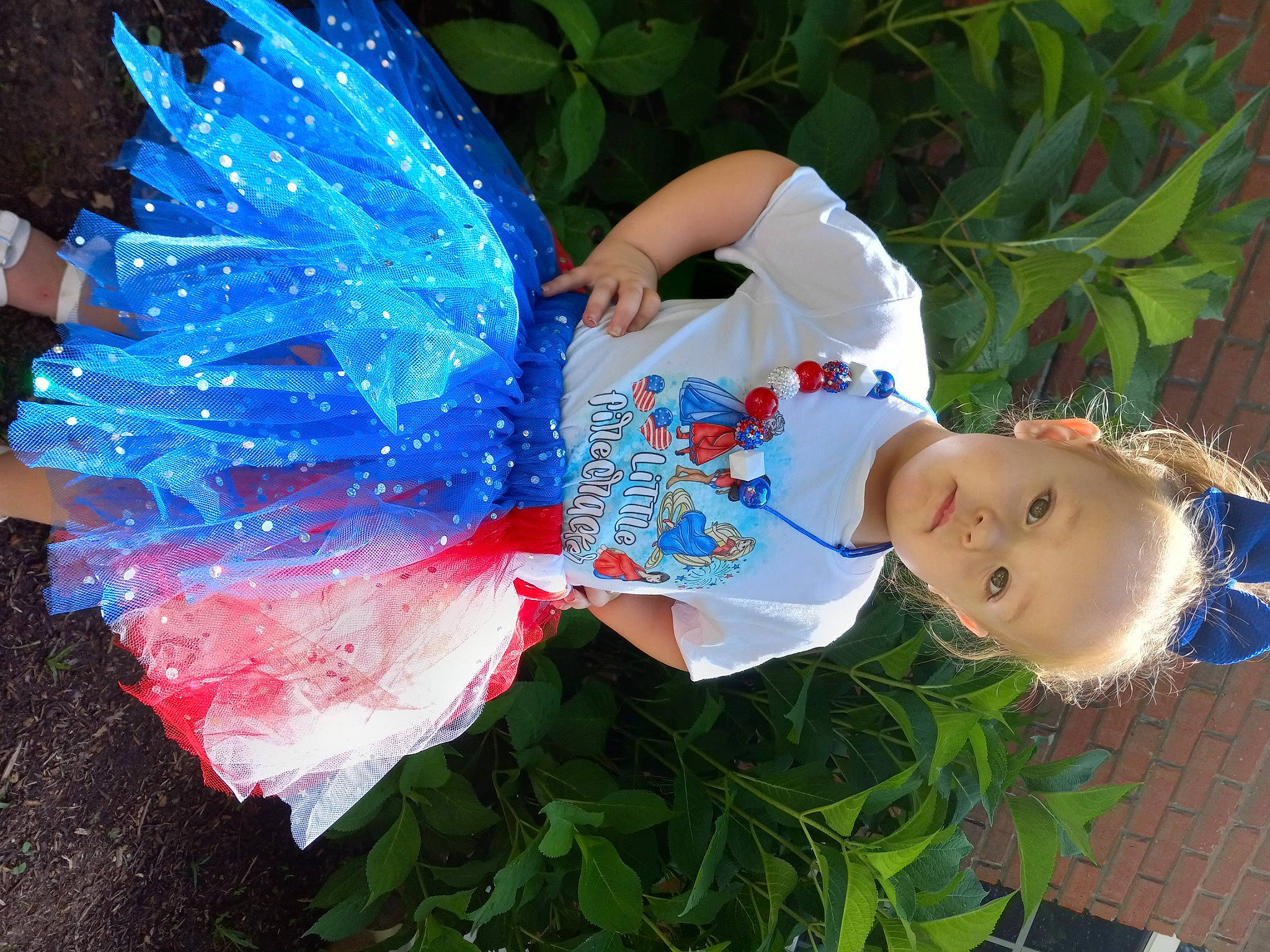 Allison joined the competition — help win amazing prizes! art, automotive_wheel_system, baby_toddler_clothing, child, costume, costume_hat, electric_blue, event, fashion_accessory, fun, grass, happy, hat, leaf, organism, party_supply, person, plant, plastic, toddler