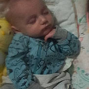 Avery joined the competition — help win amazing prizes! baby, sleeping, pajamas, blanket, bed, child, infant, resting, cozy, soft, cute, face, hand, indoors, comfort, peaceful, young, toddler, nursery, blanketed