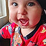 baby, toddler, child, smiling, face, cap, hat, red_clothing, onesie, indoor, window, person, cute, happy, portrait, headwear, young_child, colorful, playful, closeup