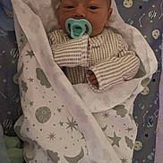 Michael is registered to the contest to win money with this photo: baby, bed, blanket, child, clouds, constellations, cozy, cute, face, hand, infant, moon, newborn, pacifier, sleeping, sleepwear, soft, stars, swaddled, wrapped