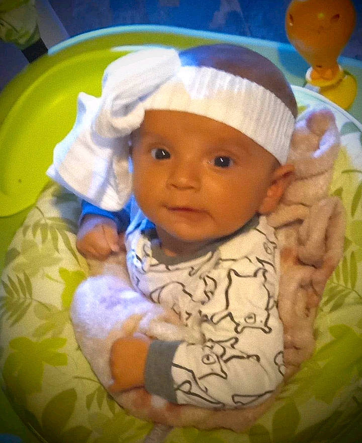 Braelynn joined the competition — help win amazing prizes! baby, baby_products, baby_safety, baby_sleeping, baby_toddler_clothing, cap, cheek, child, comfort, fun, happy, hat, headgear, headwear, linens, nose, organ, person, product, skin