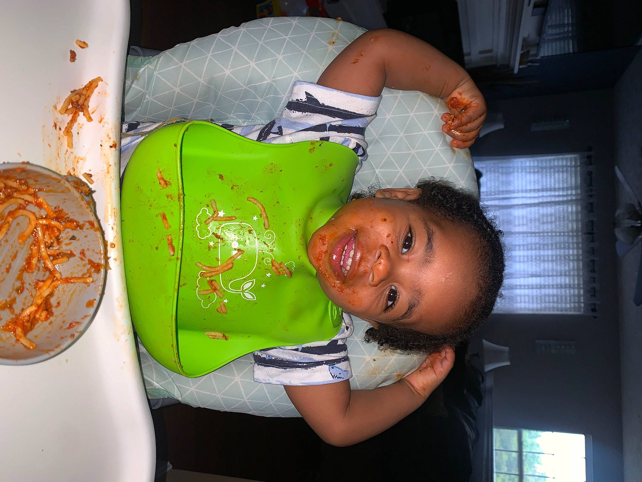 Braylon is registered to the contest to win money with this photo: baby_toddler_clothing, child, comfort_food, cuisine, dessert, event, fast_food, food, fun, happy, hat, ingredient, junk_food, person, room, smile, sweetness, toddler, visual_arts