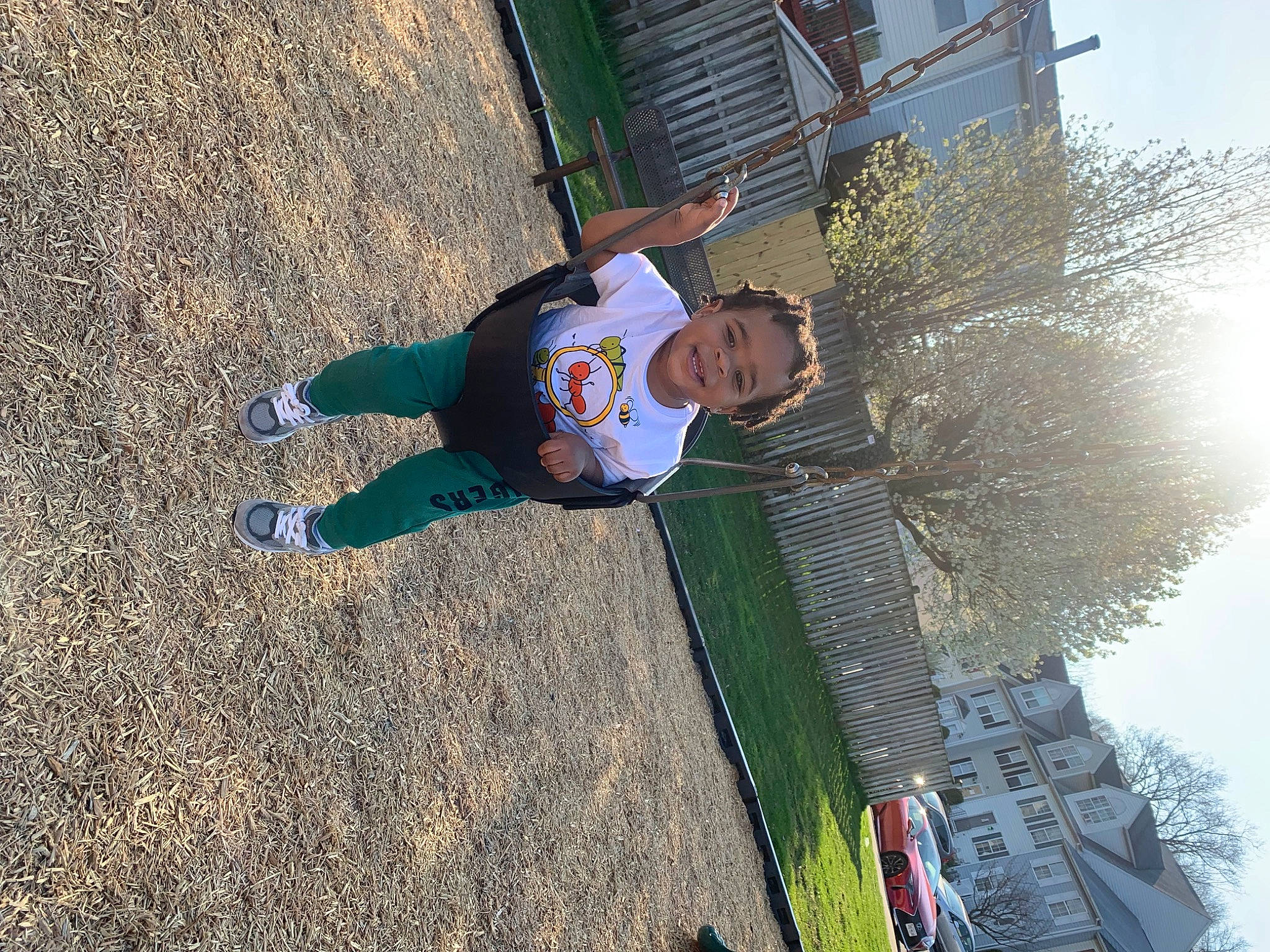 Braylon is registered to the contest to win money with this photo: asphalt, city, electric_blue, fun, grass, joy, leisure, person, recreation, shadow, sky, smile, soil, toddler, tree, walking_shoe