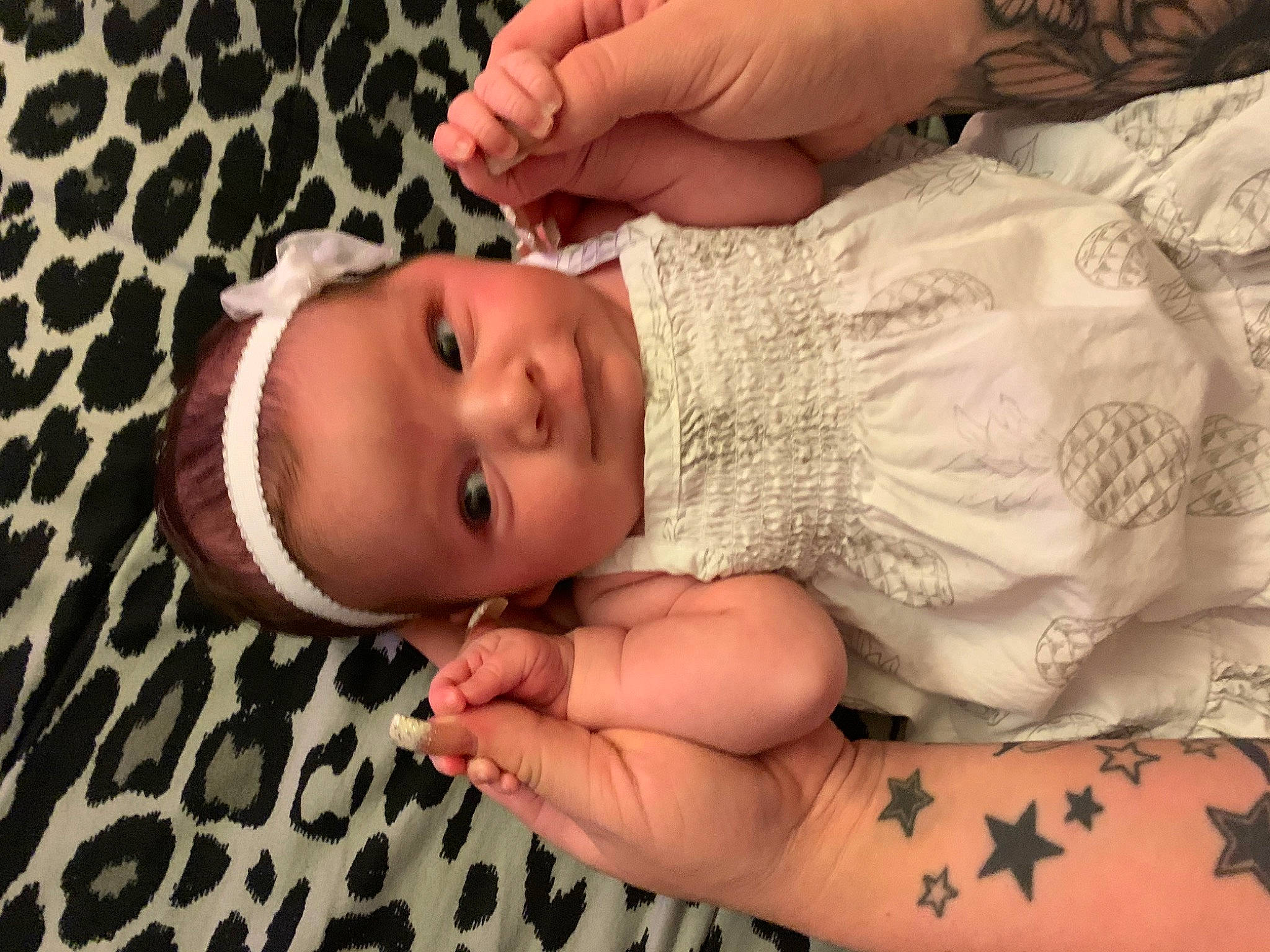 Cleopatra is registered to the contest to win money with this photo: arm, baby, cheek, child, ear, eye, face, finger, foot, hand, head, leg, lip, mouth, muscle, nail, nose, person, skin, thumb