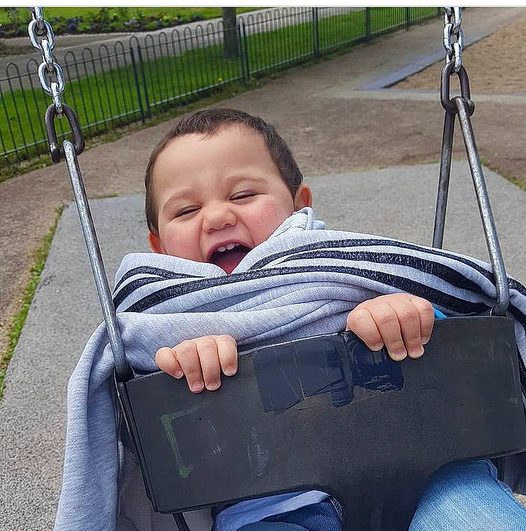 Nolan a rejoint le concours — aidez-le/la à gagner de superbes lots ! baby, baby_toddler_clothing, beauty, cheek, child, comfort, electric_blue, facial_expression, fence, fun, grass, leisure, mammal, person, plant, playground, product, sitting, skin, toddler