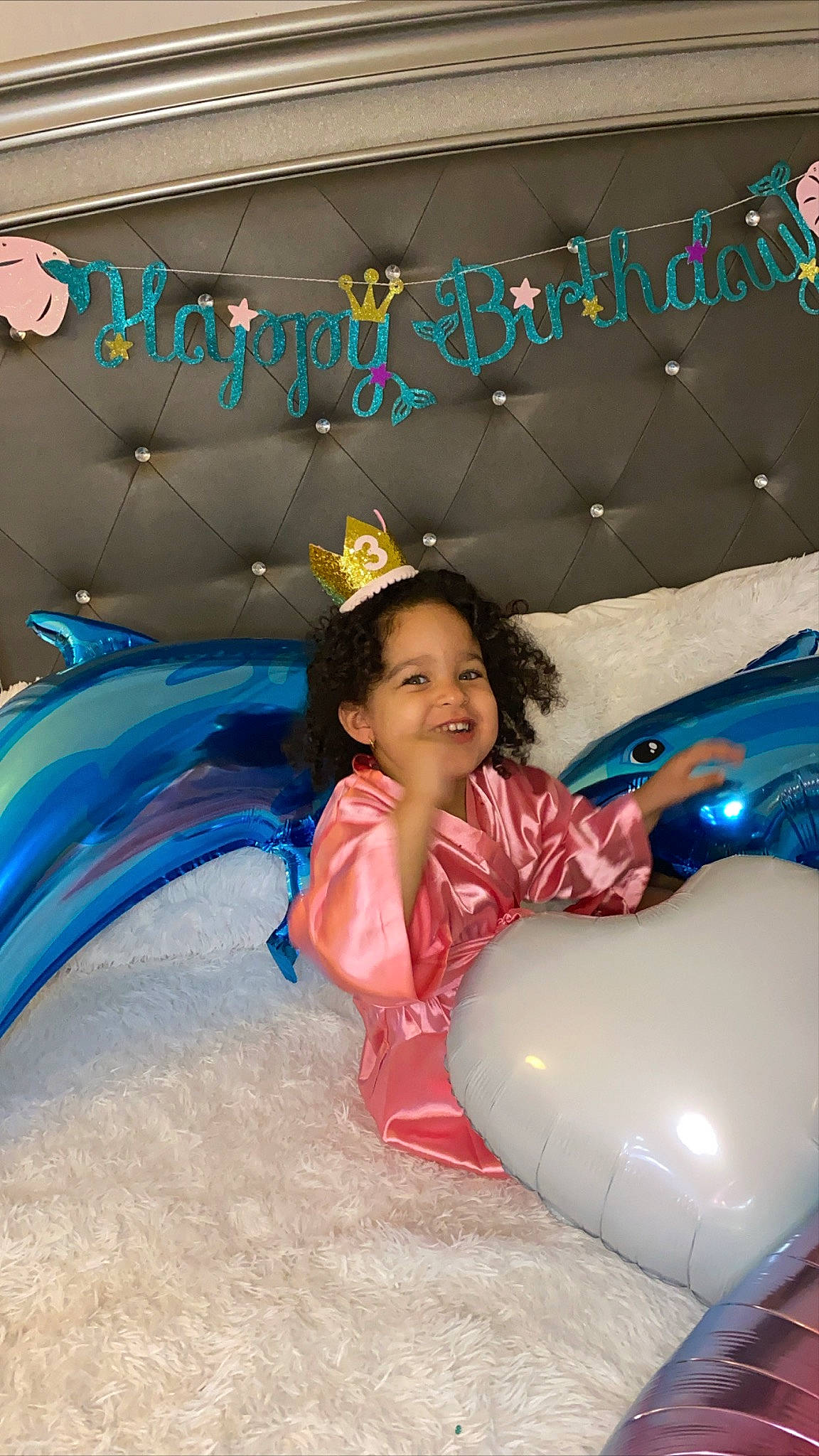 Bethany is registered to the contest to win money with this photo: balloon, child, fun, games, inflatable, joy, leisure, party_supply, person, play, recreation, sitting, smile, toddler, vacation