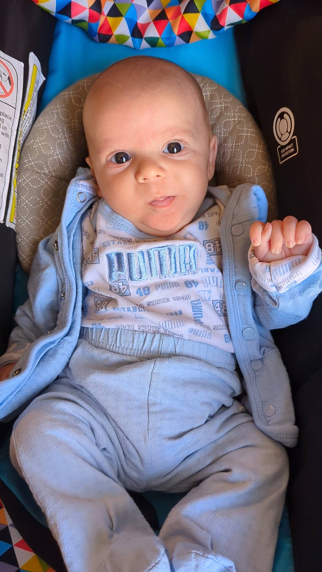 Miguel joined the competition — help win amazing prizes! baby, baby_toddler_clothing, blue, cheek, chin, comfort, eye, face, facial_expression, finger, gesture, hand, head, iris, lip, mouth, nose, person, skin, sleeve