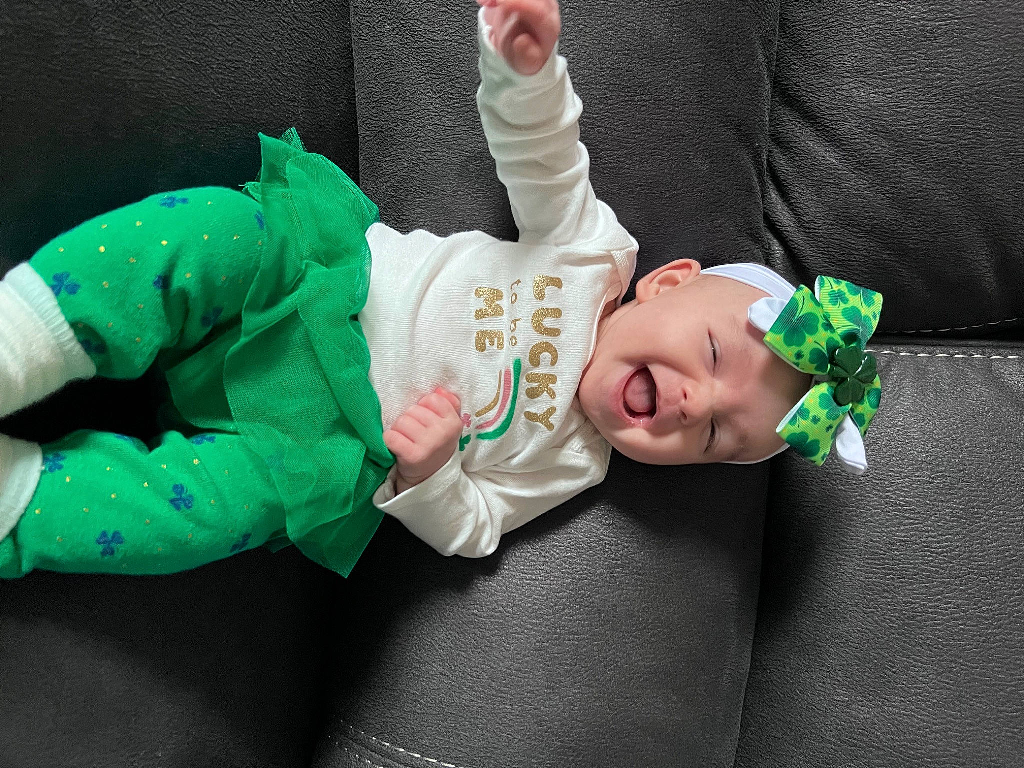 Lorelai joined the competition — help win amazing prizes! baby, baby_products, baby_toddler_clothing, child, comfort, fashion_accessory, gesture, grass, hand, hat, head, person, room, sitting, sleeve, sock, toddler