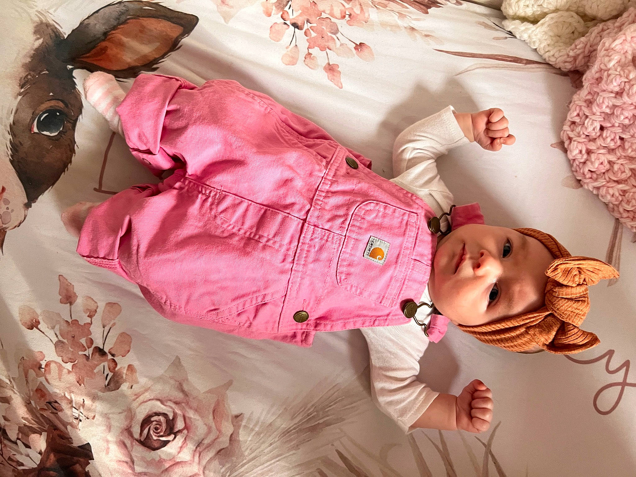 Lorelai joined the competition — help win amazing prizes! baby, baby_products, baby_sleeping, baby_toddler_clothing, cheek, child, comfort, hand, happy, headwear, linens, magenta, pattern, peach, person, pink, product, room, skin, sleeve