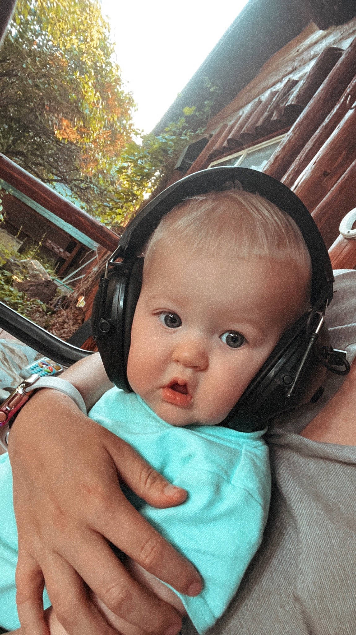Finley joined the competition — help win amazing prizes! audio_equipment, baby_toddler_clothing, black_hair, cheek, child, ear, electronic_device, eyebrow, eyelash, finger, fun, hand, happy, hearing, leisure, nose, person, skin, toddler, travel