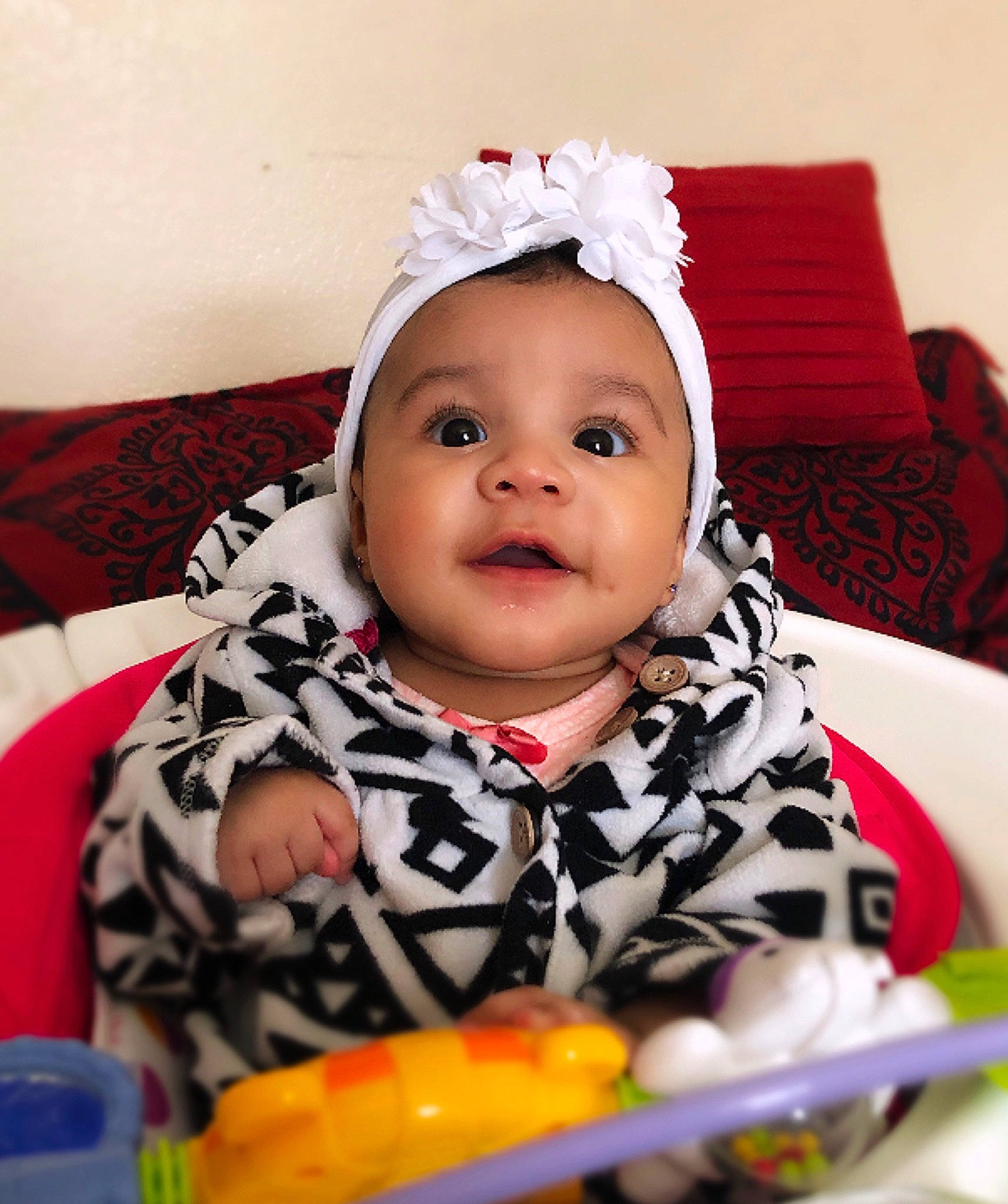 Ashlee is registered to the contest to win money with this photo: baby, cheek, child, eye, face, food, hair_accessory, head, headgear, person, play, skin, toddler