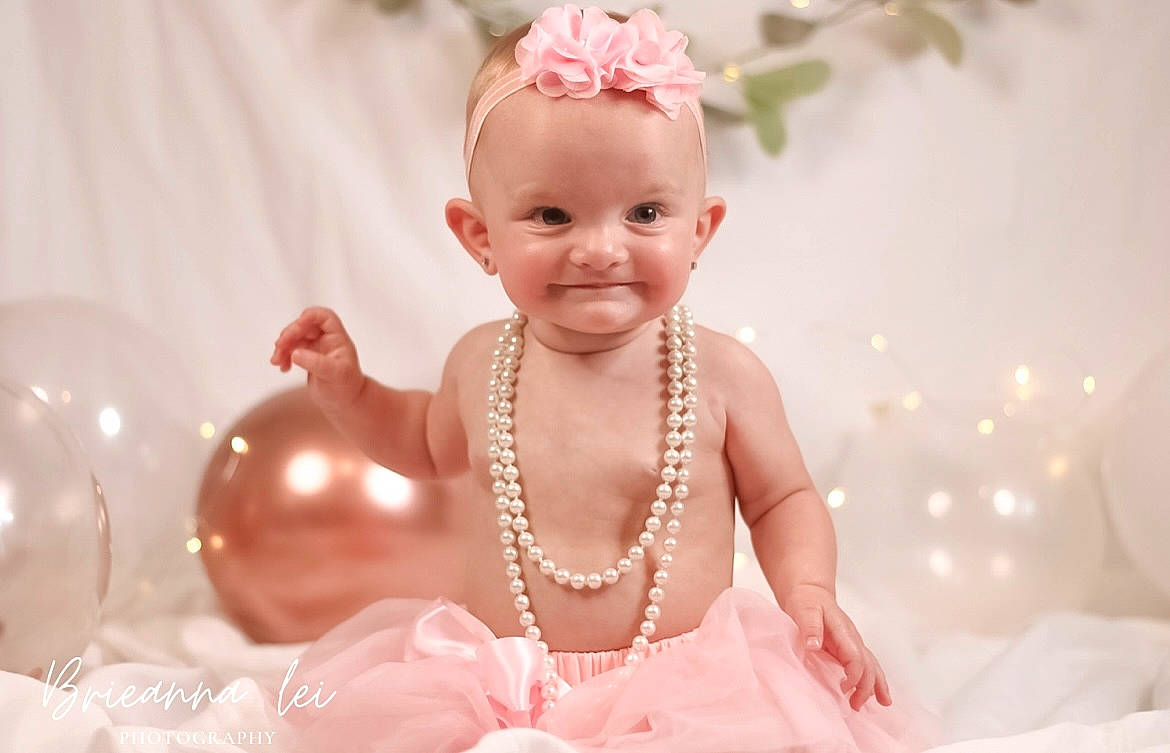 Hasley joined the competition — help win amazing prizes! arm, baby, baby_toddler_clothing, child, event, fashion_accessory, finger, fun, happy, headpiece, jewellery, joy, neck, necklace, ornament, person, pink, skin, smile, toddler