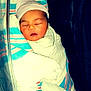 Liliana is registered to the contest to win money with this photo: newborn, baby, sleeping, blanket, hospital, bassinet, hat, wrapped, infant, child, peaceful, face, person, cute, soft, warm, resting, healthcare, bed, towel