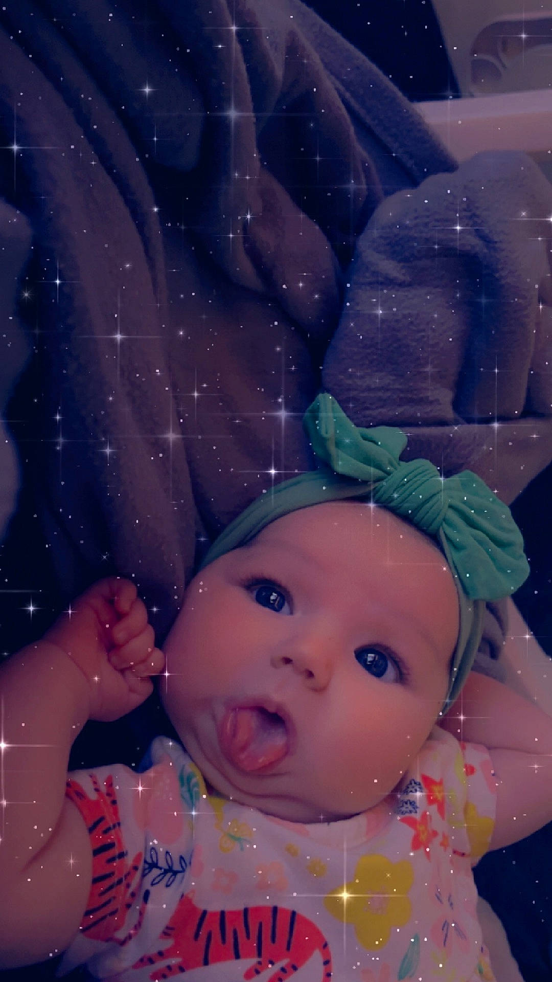 Scarlett is registered to the contest to win money with this photo: baby, bodypart, bonnet, cap, clothing, face, finger, food, fruit, hand, hat, head, mouth, newborn, pear, person, photography, plant, portrait, produce