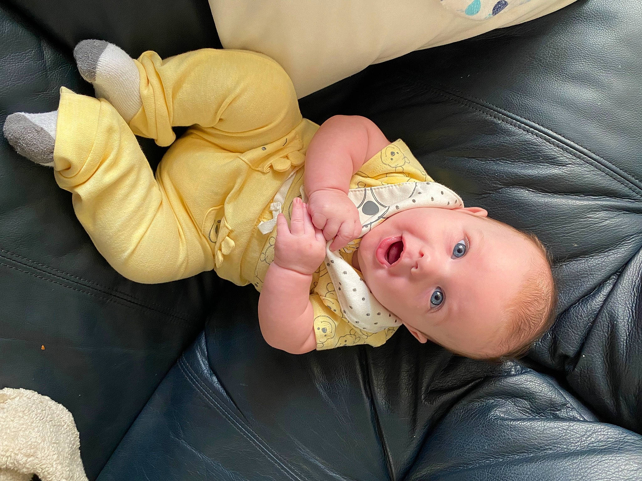 Bellamy is registered to the contest to win money with this photo: baby, baby_products, baby_toddler_clothing, cheek, child, comfort, finger, gesture, head, mouth, nail, person, room, skin, surprise, thumb, toddler, wrist