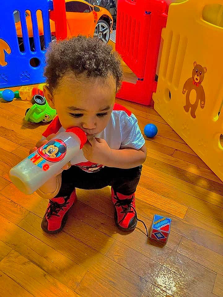 Jayceon joined the competition — help win amazing prizes! baby, child, floor, flooring, fun, games, happy, hardwood, leisure, orange, person, play, recreation, red, room, sitting, toddler, toy, wood, world