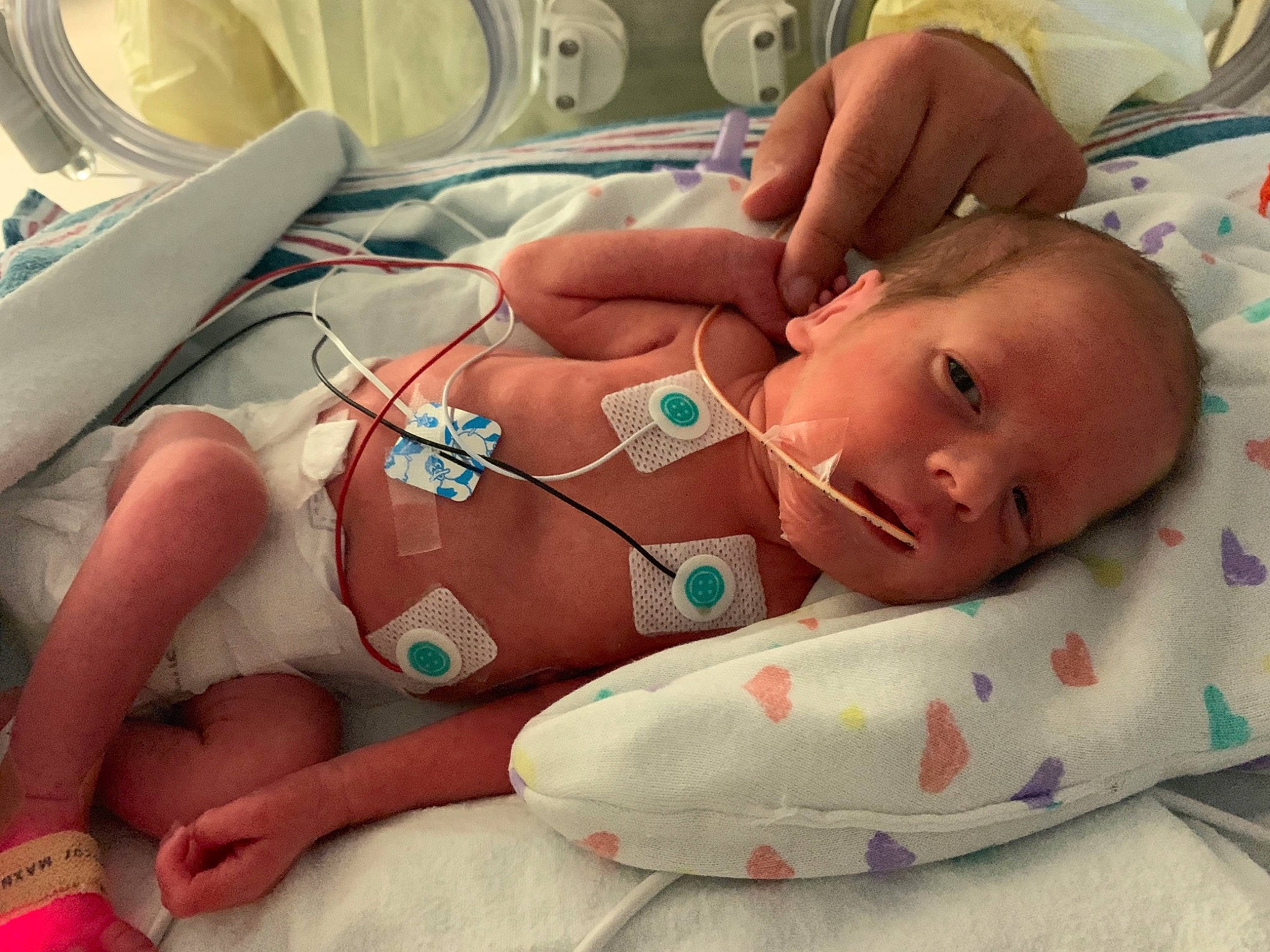 Josiah is registered to the contest to win money with this photo: baby, bedtime, birth, cheek, child, childbirth, hand, person