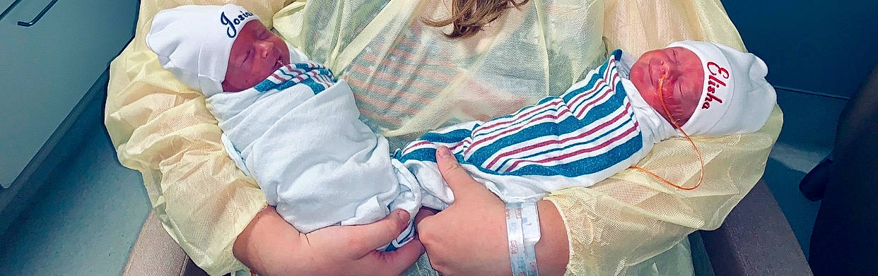 Elisha is registered to the contest to win money with this photo: arm, baby, birth, child, childbirth, hand, headwear, leg, person, toddler