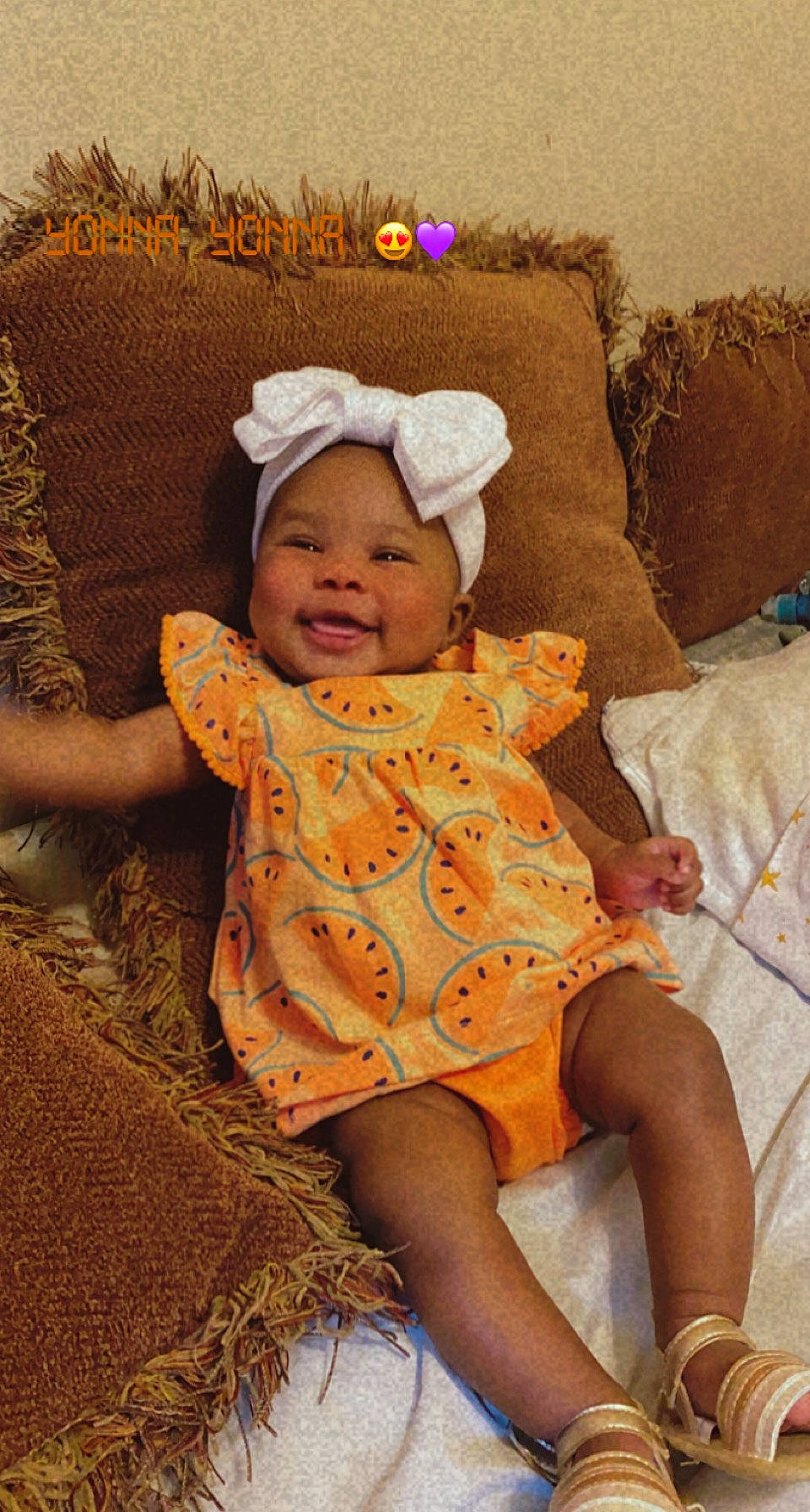 Kamelia is registered to the contest to win money with this photo: baby, baby_toddler_clothing, comfort, couch, eye, face, fun, happy, head, headgear, headwear, human_body, lap, linens, person, skin, smile, sun_hat, textile, thigh