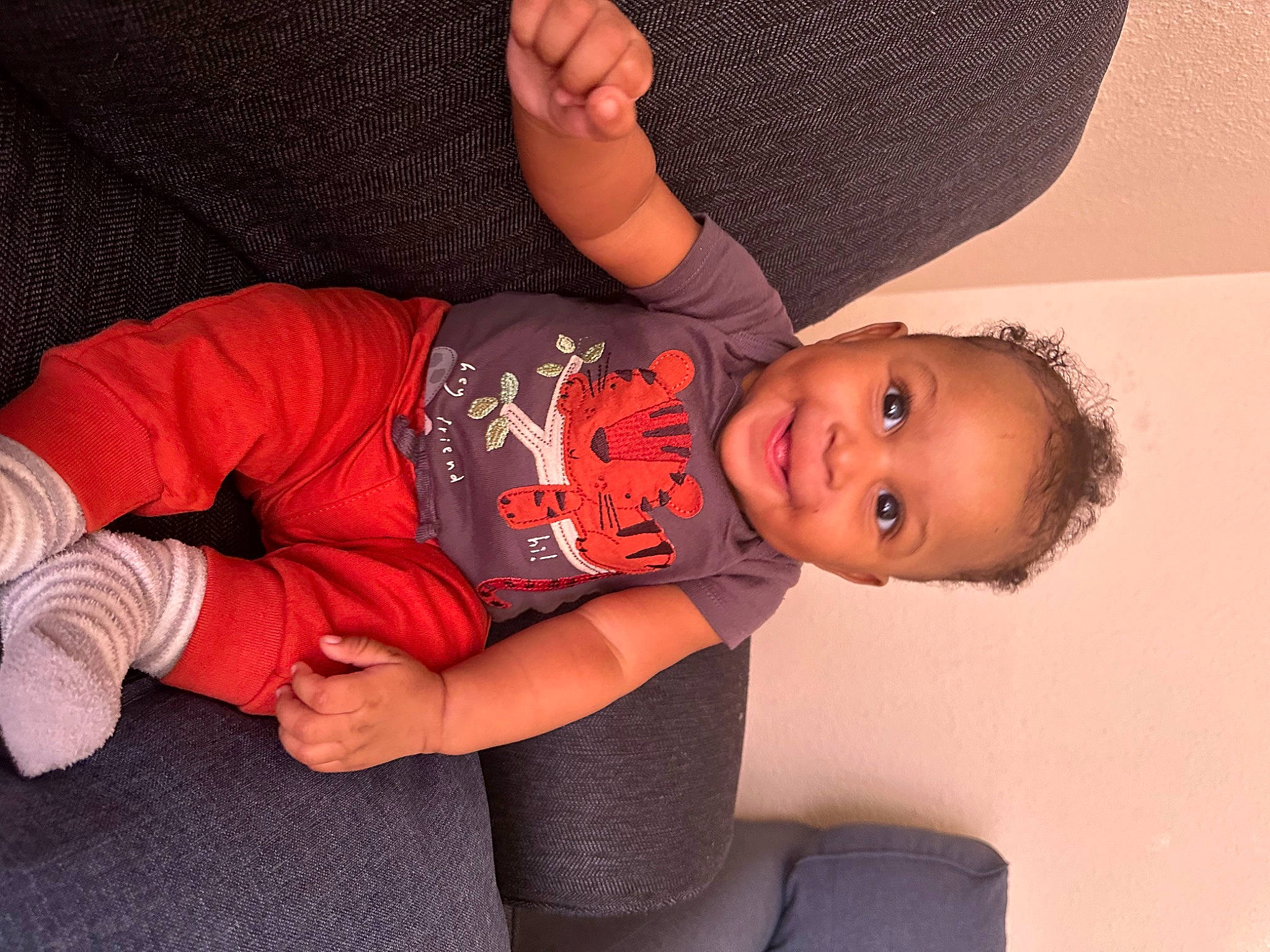 Adonis is registered to the contest to win money with this photo: abdomen, arm, baby_toddler_clothing, comfort, elbow, finger, flash_photography, happy, hat, headgear, joint, joy, knee, mouth, person, skin, sleeve, smile, t_shirt, thigh