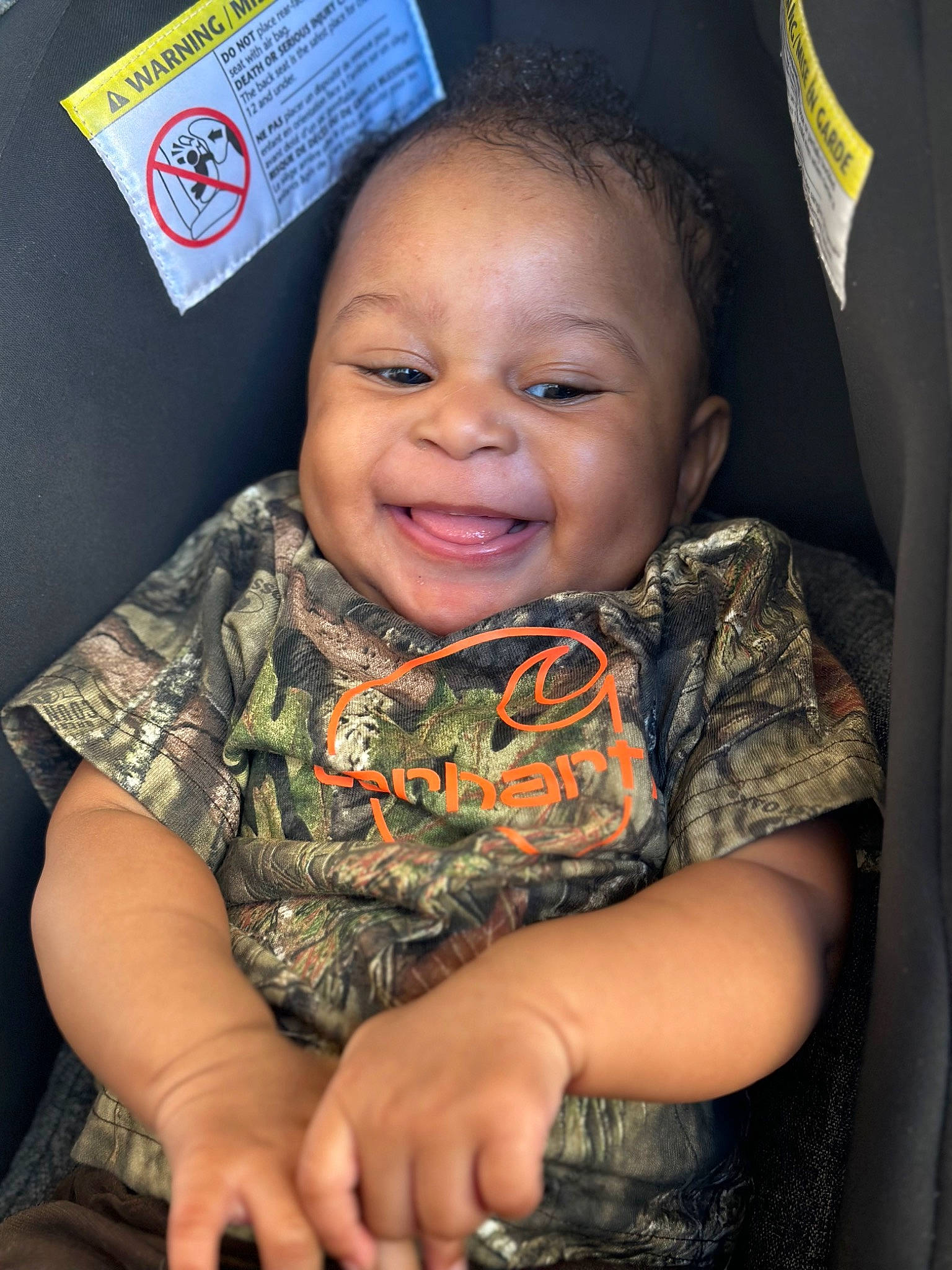 Adonis is registered to the contest to win money with this photo: arm, black, cheek, child, chin, cool, eye, eyebrow, forehead, hairstyle, happy, head, iris, joy, mouth, nose, organ, person, skin, sleeve