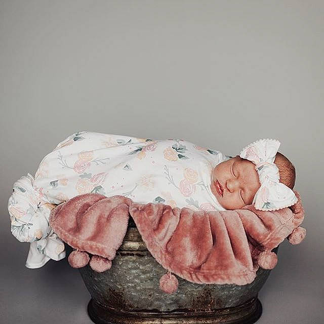 Sage is registered to the contest to win money with this photo: art, baby, child, figurine, headwear, nonbuilding_structure, person, pink, sculpture, toddler
