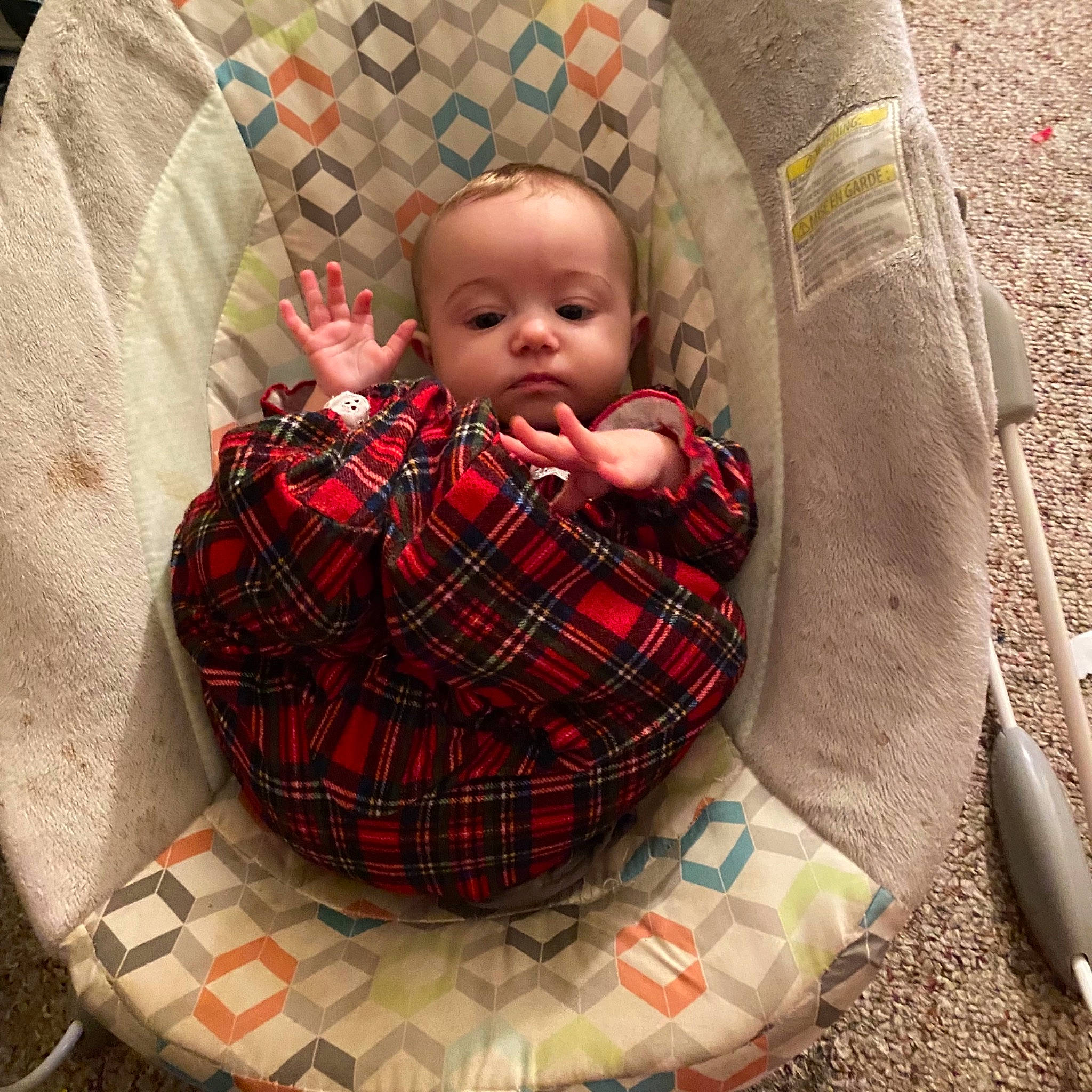 Clara is registered to the contest to win money with this photo: baby, baby_products, baby_sleeping, baby_toddler_clothing, baby_toys, carmine, child, comfort, grass, head, lap, linens, pattern, person, plaid, sitting, sleeve, tartan, textile, toddler