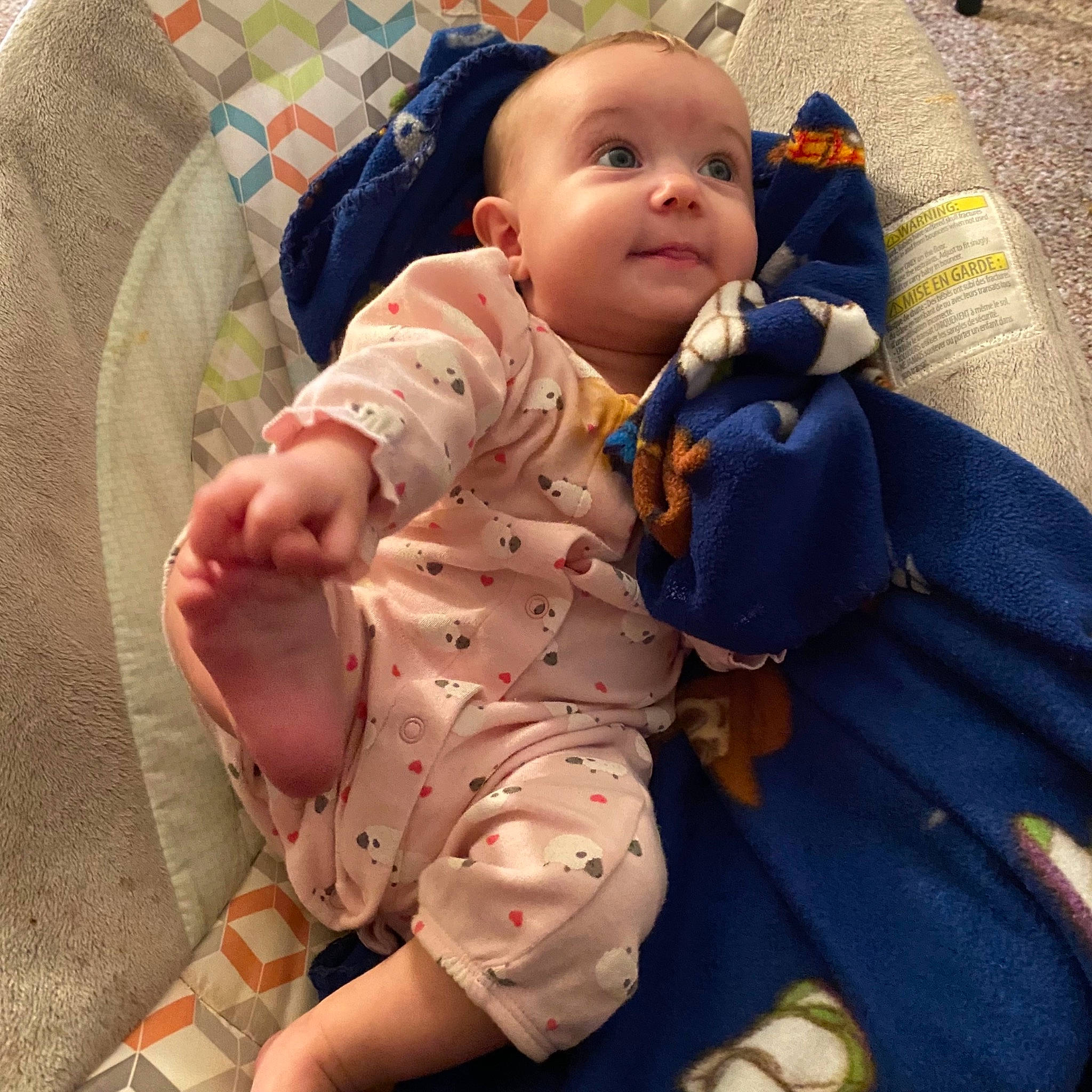 Clara joined the competition — help win amazing prizes! baby, baby_products, baby_safety, baby_sleeping, baby_toddler_clothing, cheek, child, comfort, eye, foot, happy, head, lap, linens, pattern, person, sitting, skin, sleeve, smile
