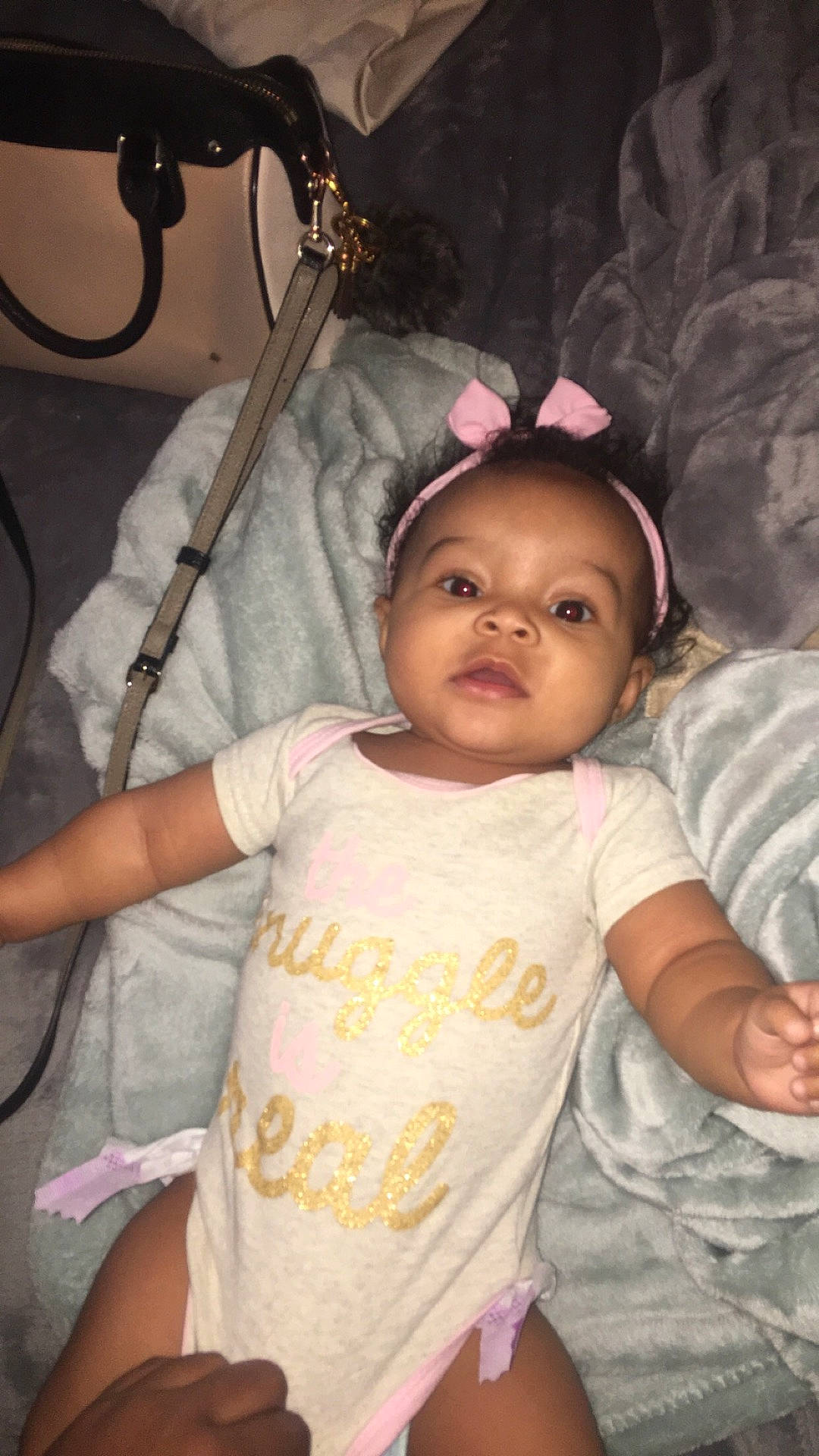 Brooklynn is registered to the contest to win money with this photo: abdomen, child, day, girl, hair_accessory, head, headgear, infant, person, pink, product, skin, smile, toddler, trunk