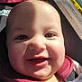 baby, car_seat, cheeks, child, closeup, clothing, cute, face, happy, headrest, indoors, infant, portrait, safety_harness, seatbelt, skin, smile, sunlight, warning_label, young
