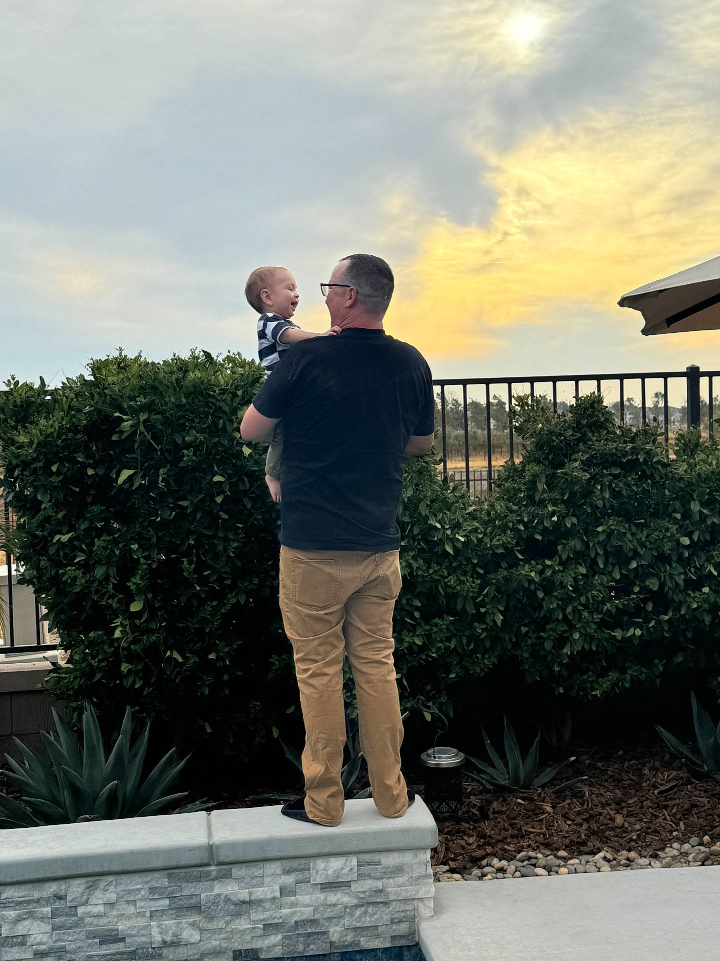 Dominick joined the competition — help win amazing prizes! accessories, adult, baby, clothing, face, glasses, head, male, man, pants, path, person, photography, plant, portrait, pottedplant, shorts, standing, tree, walkway