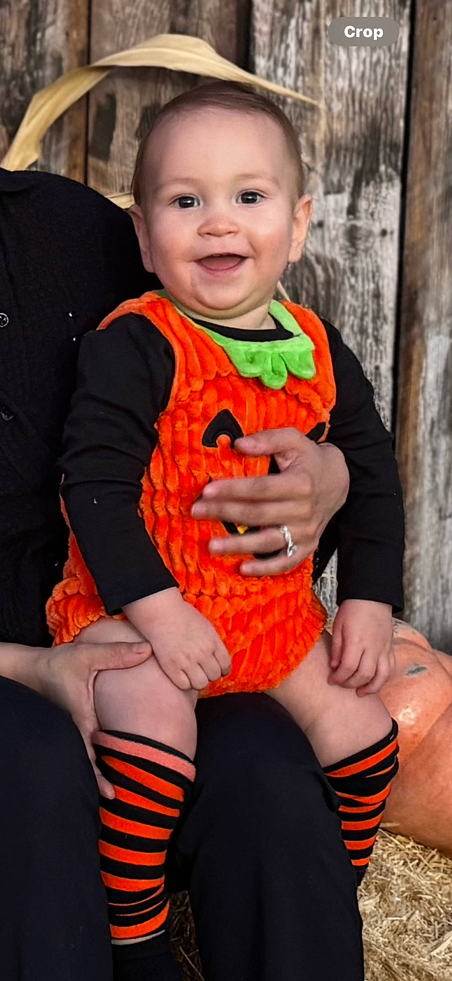 Dominick is registered to the contest to win money with this photo: baby, bodypart, clothing, coat, face, finger, hand, happy, head, hosiery, jacket, knitwear, pants, person, photography, portrait, shorts, sitting, smile, sock