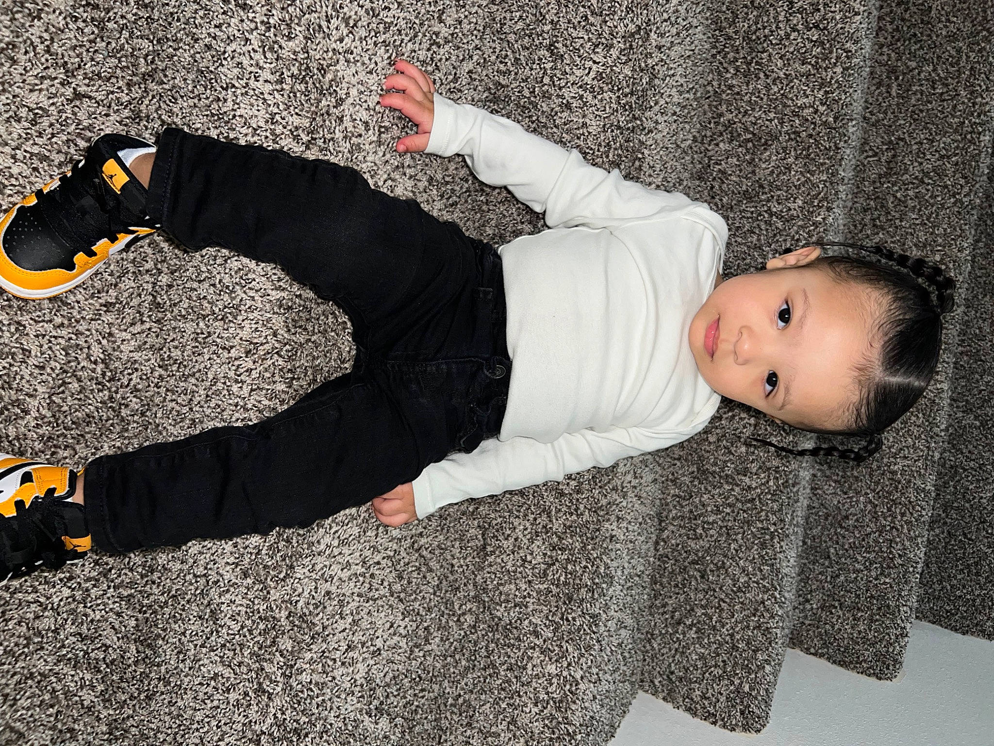 Zaylen is registered to the contest to win money with this photo: asphalt, baby_toddler_clothing, child, comfort, design, flash_photography, flooring, fun, human_body, human_leg, joint, knee, leg, pattern, person, sitting, sportswear, thigh, toddler, walking_shoe