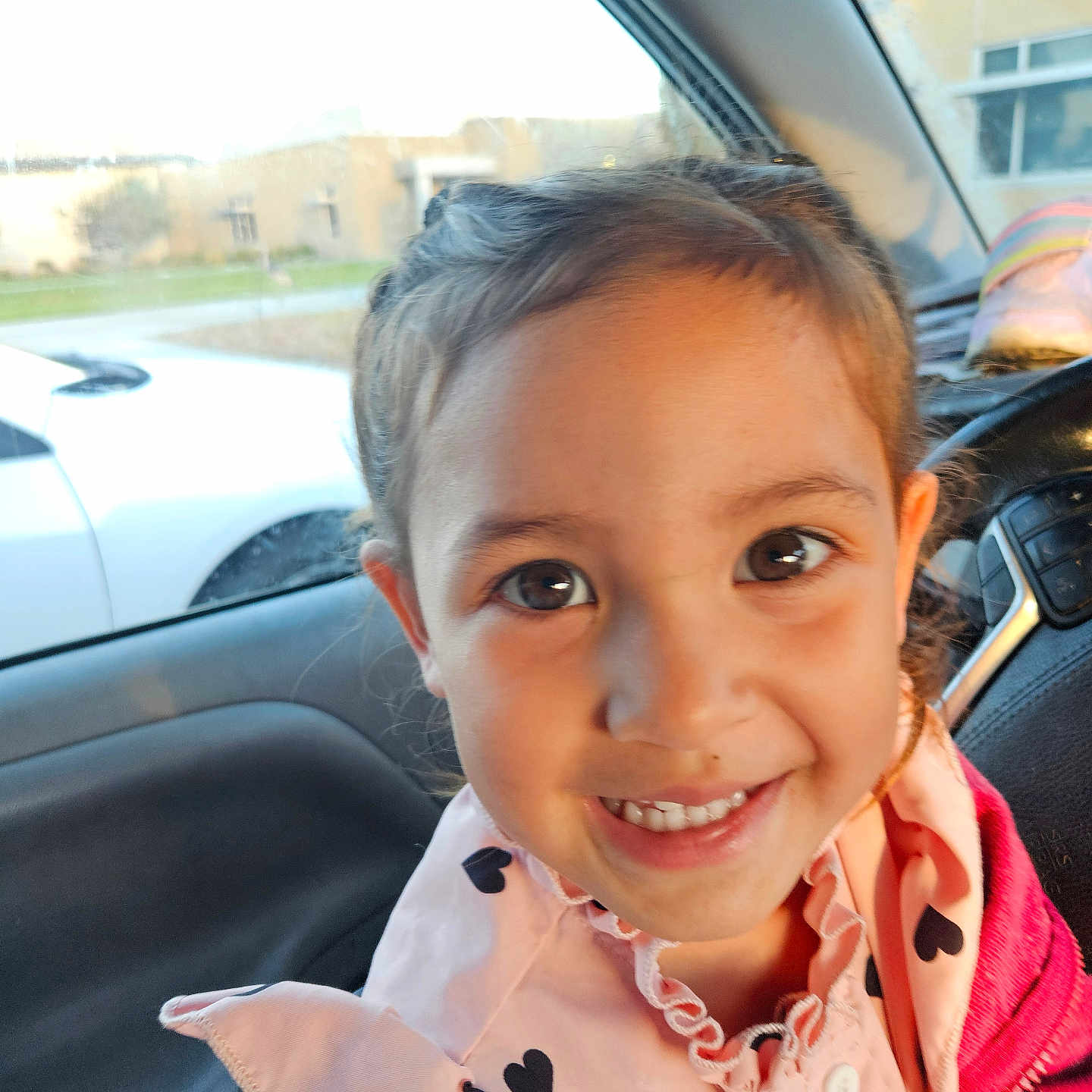 Kalianne is registered to the contest to win money with this photo: accessories, bodypart, car, child, clothing, coat, face, female, girl, happy, head, jacket, mouth, person, photography, portrait, smile, teeth, transportation, vehicle