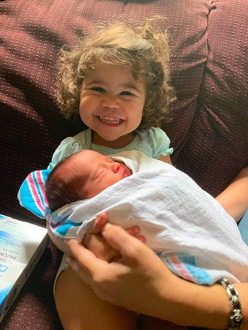 Lyric is registered to the contest to win money with this photo: baby, cheek, chest, child, comfort, finger, gesture, hand, happy, head, human_body, joint, joy, leg, mouth, organ, person, shoulder, skin, smile