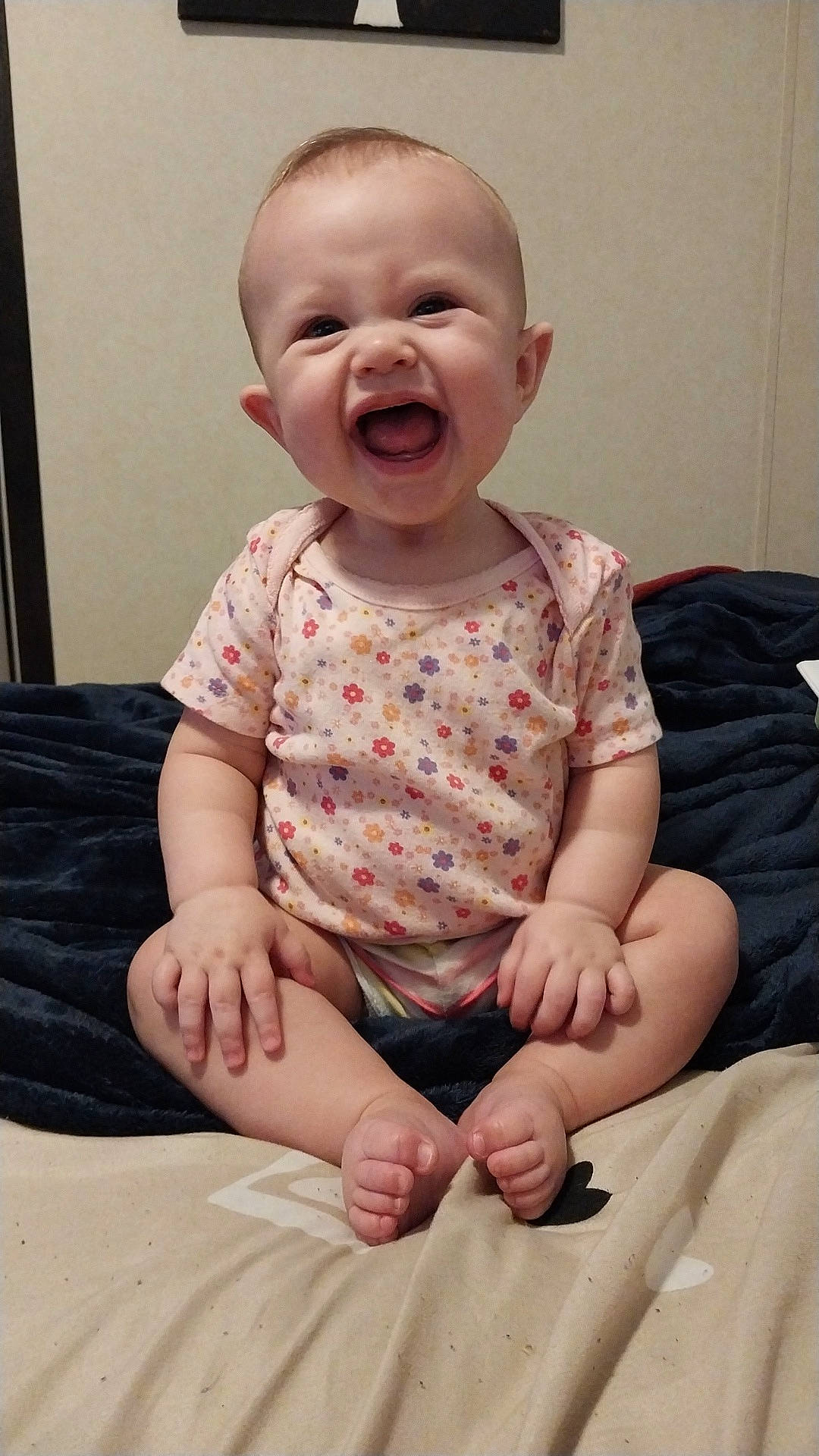 Salem is registered to the contest to win money with this photo: arm, baby, baby_toddler_clothing, beauty, cheek, chin, comfort, eye, face, finger, gesture, happy, head, human_body, leg, person, pink, skin, sleeve, smile